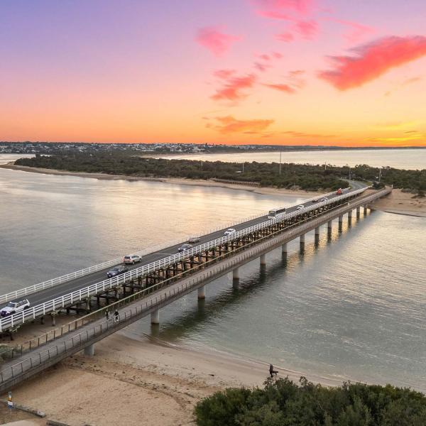 Aerial view of Barwon Heads Bridge at sunset