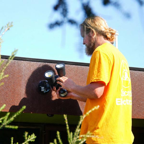 Electrician Sean O'Conner installing CCTV in Ocean Grove home